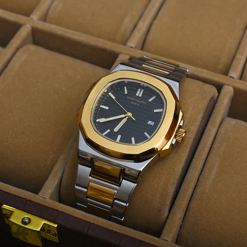 PATEK PHILIPPE Nautilus STAINLESS STEEL WATCH � Two-tone/Black-Dial