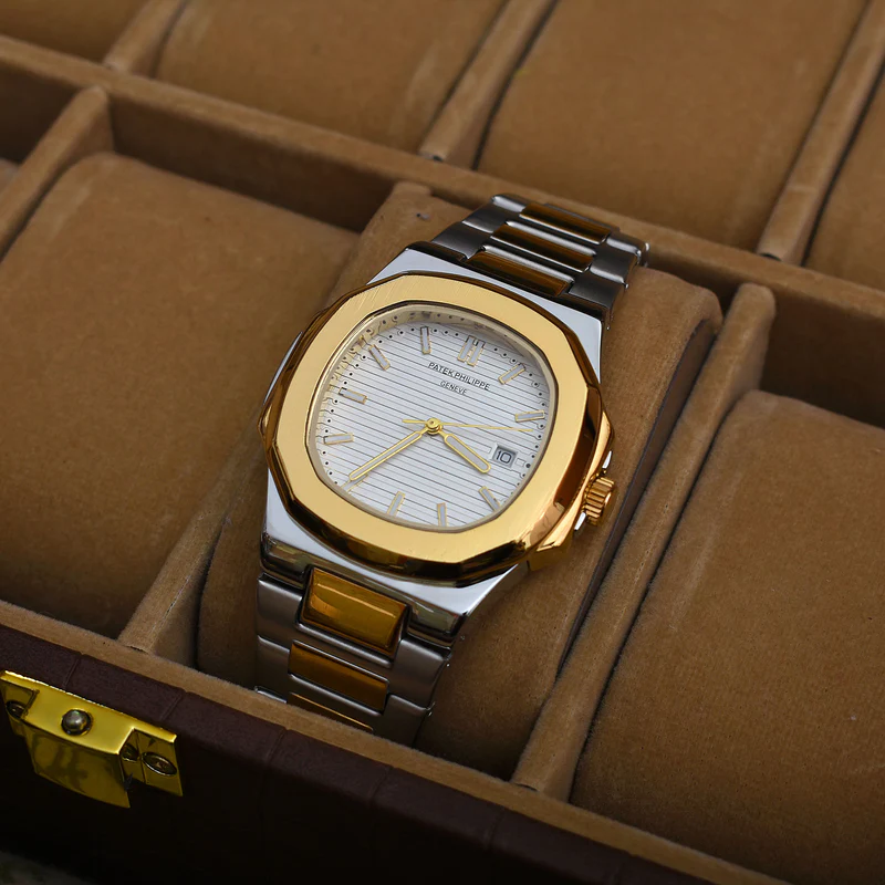 PATEK PHILIPPE Nautilus STAINLESS STEEL WATCH � two tone/White Dial